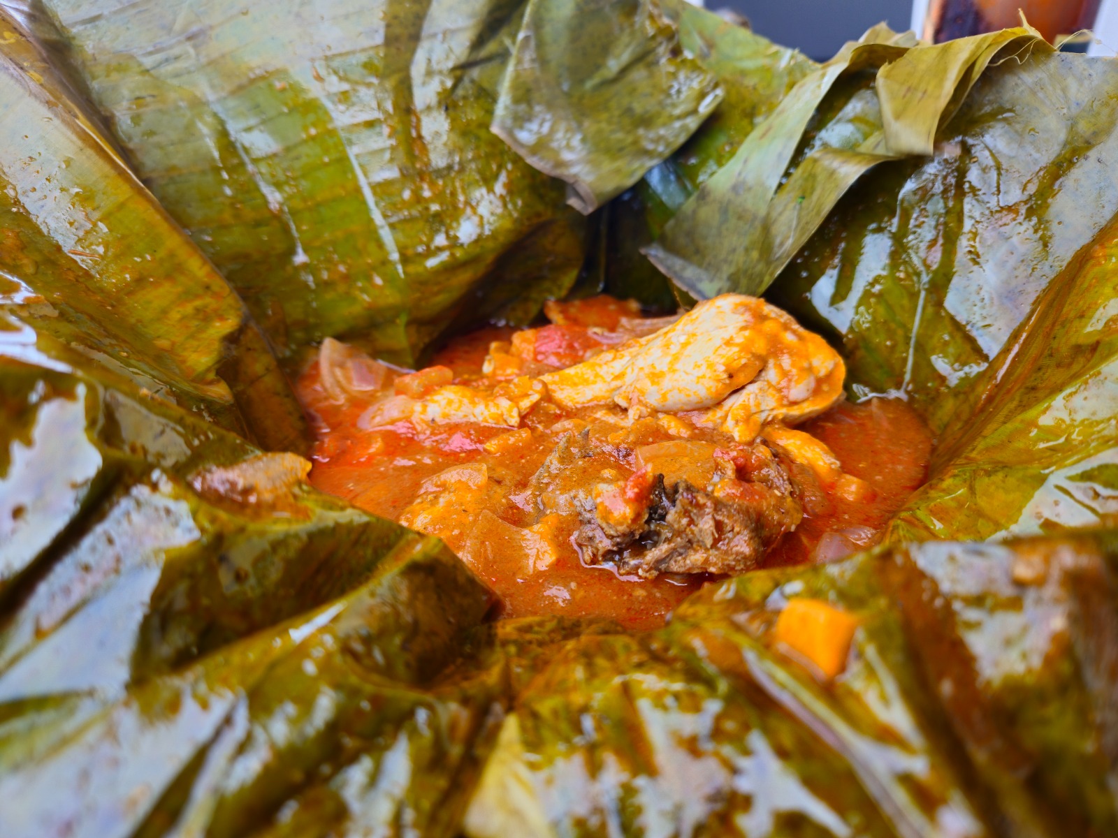 Luwombo wrapped in banana leaf in Uganda